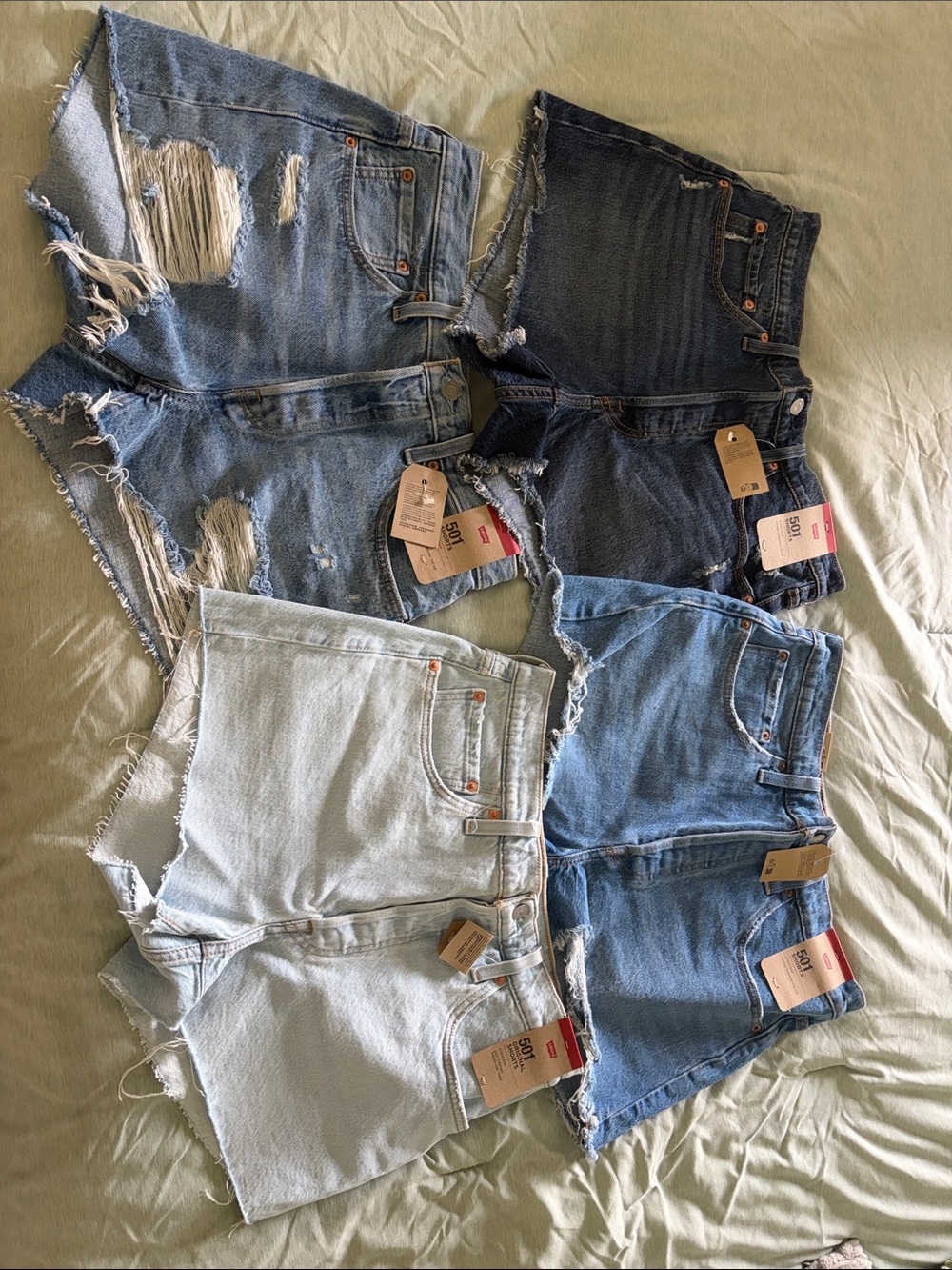 Levi's Women's Ankle & Cropped Denim Shorts in Light, Medium and Dark Blue